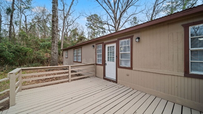 Photo - Rural, wooded living in this 4 bedroom, 2 full bath home on just under a quarter of an acre. NEW ...