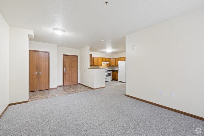 3BR, 2BA - 1,300SF - Living Room and Kitchen