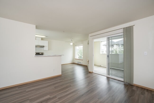 Bright, open living spaces with private balcony access.