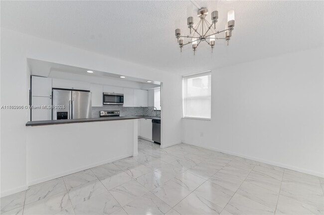 Building Photo - 20301 NE 30th Ave Unit # 308-5 Rental