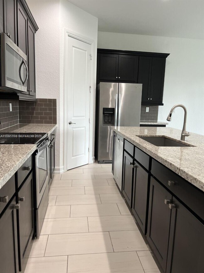 Photo - 11539 SW 13th Dr