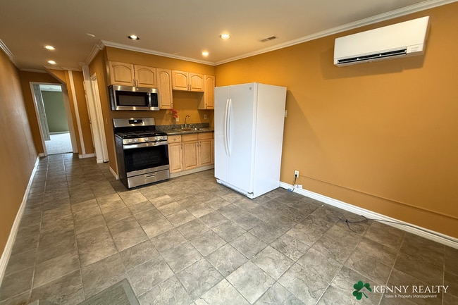 Photo - Spacious 1-Bedroom Lower-Level Apartment with Private Patio
