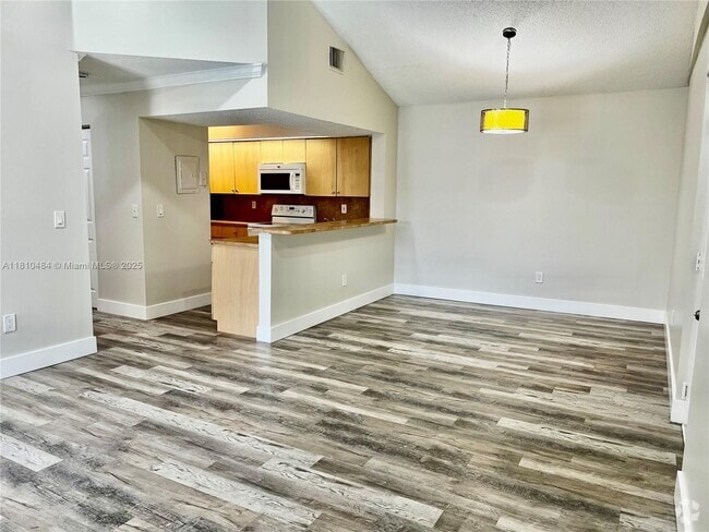 Building Photo - 18850 NW 57th Ave Unit 305 Rental