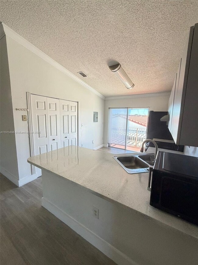 Photo - 3375 W 76th St Unit 211