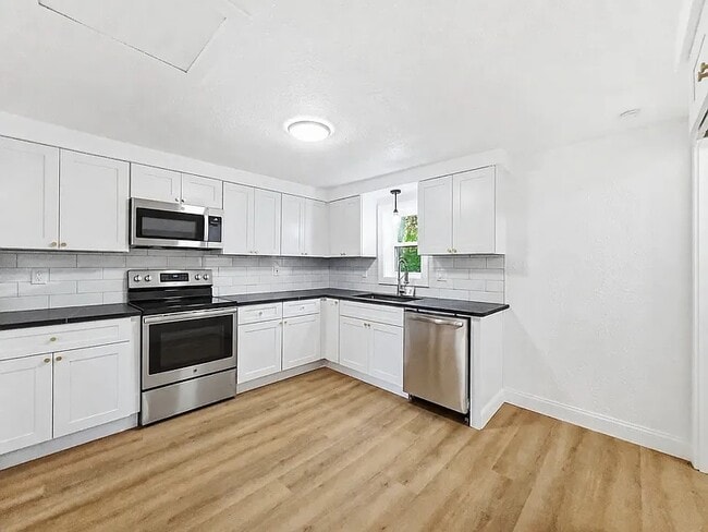 Photo - Cozy 3-BR Home w/ Fenced Yard & Pet-Friendly Perks in Flint Charter Township!