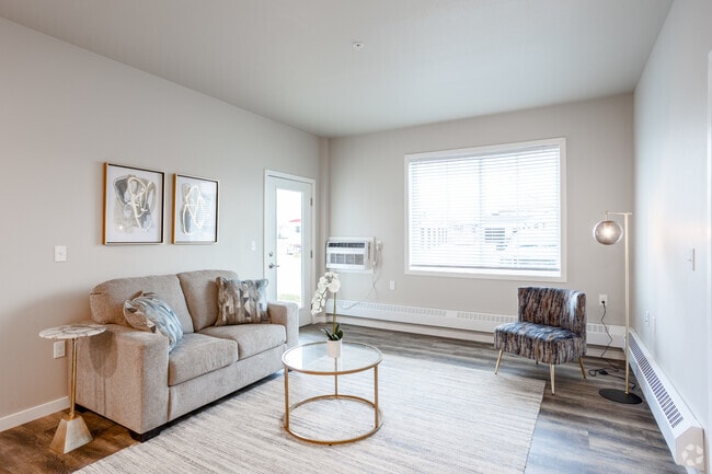 2BR, 2BA - 971SF - Living Room - Creekside Apartment Homes