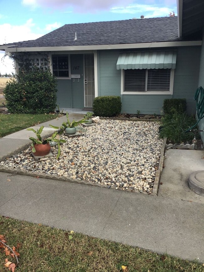 Building Photo - COMING SOON!! 2 Bedroom 2 bath in 55+ Comm... Rental