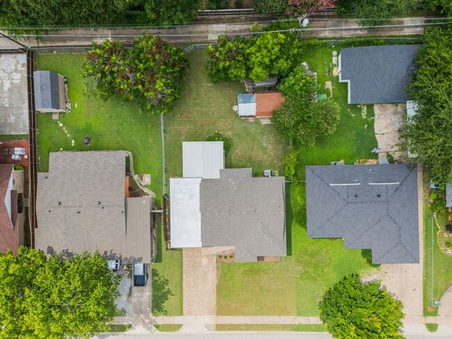 Photo - **$40K+ IN UPGRADES AND A FENCED BACKYARD WITH TWO STORAGE BUILDINGS**