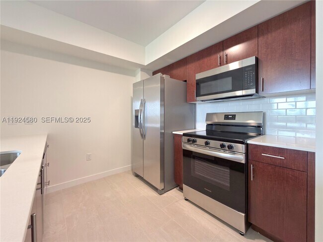 Building Photo - 11239 NW 4th St Unit A1.20