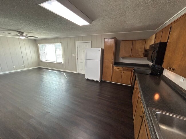 Photo - 1/1 Duplex / Fridge, Washer & Dryer Included / Large Front Deck / Small Fenced in Side Yard/ NBISD