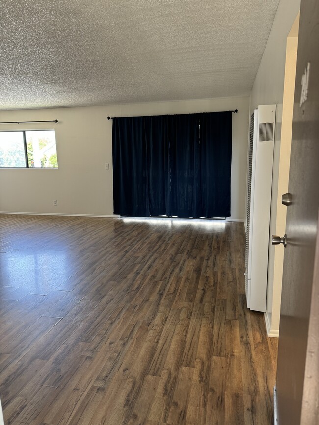 Building Photo - 5075 Atlantic Ave Unit #201