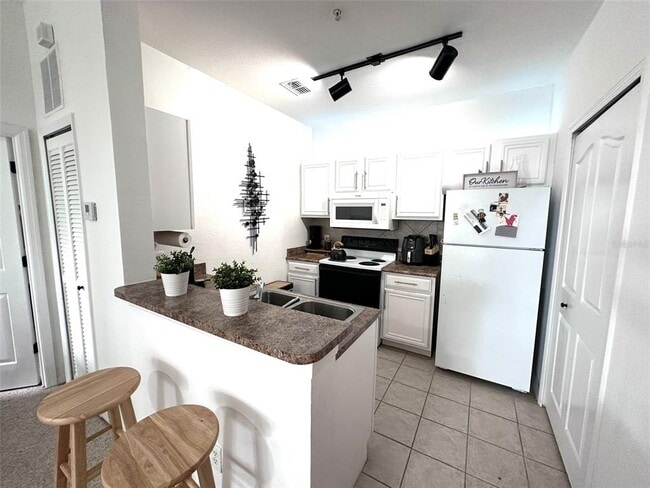 Photo - 6137 Metrowest Blvd Unit 304