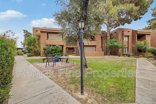 Building Photo - 4704 E Paradise Village Pkwy N Unit #111