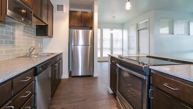 Kitchen with Stainless Steel Appliances and Granite Countertops