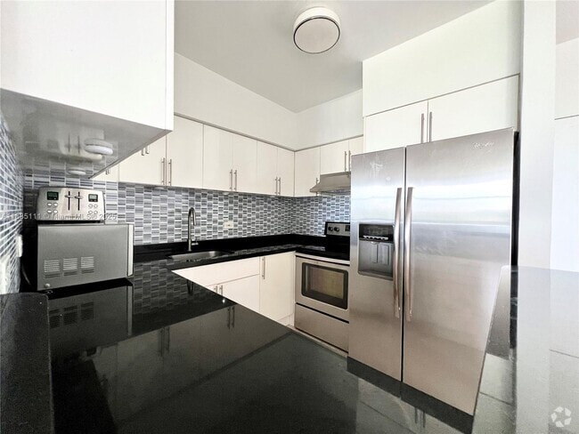 Building Photo - 7441 Wayne Ave Unit 6Q Rental