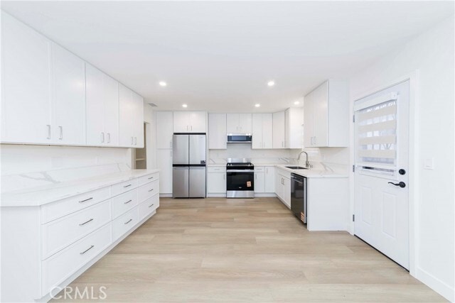 Building Photo - 16956 Denker Ave