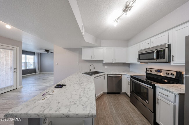 Building Photo - 8787 E Mountain View Rd Unit 1101