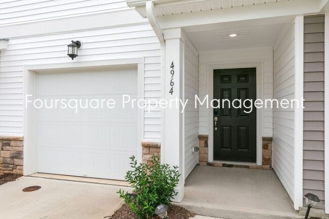 Photo - Stylish 3-Level Townhome with Bonus Suite, Deck & Garage – Near I-540 and Shopping