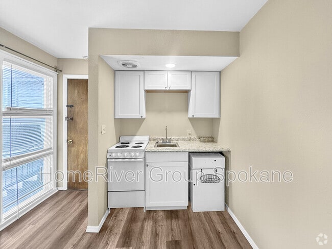 Building Photo - 634 E 23rd Ave Rental