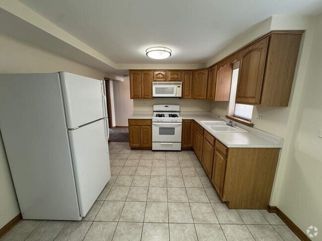 Building Photo - 4752 N Menard Ave Unit 2 Rental