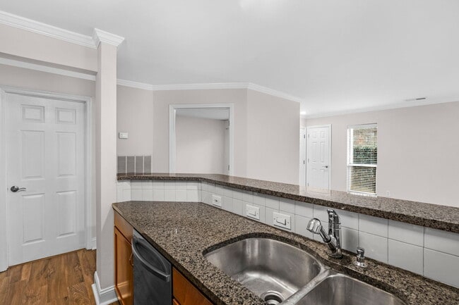 Kitchen View of bedroom door and entrance. - 2508 Cranbrook Ln Unit #1