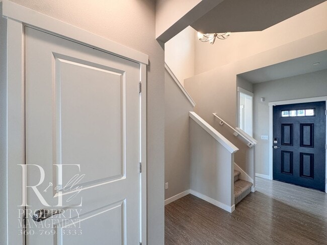 Photo - Vaulted Ceilings, Tree-Lined Views & a Spacious Primary Suite Retreat