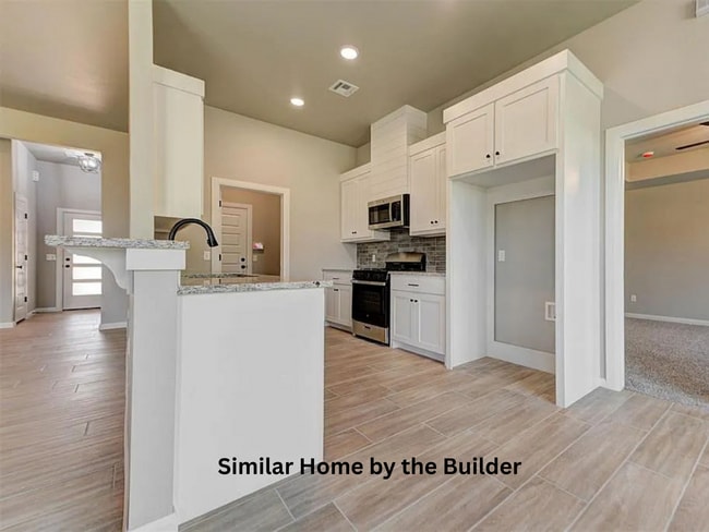 Photo - Brand-New 4-Bedroom Home with Modern Finishes & 3-Car Garage in Mustang