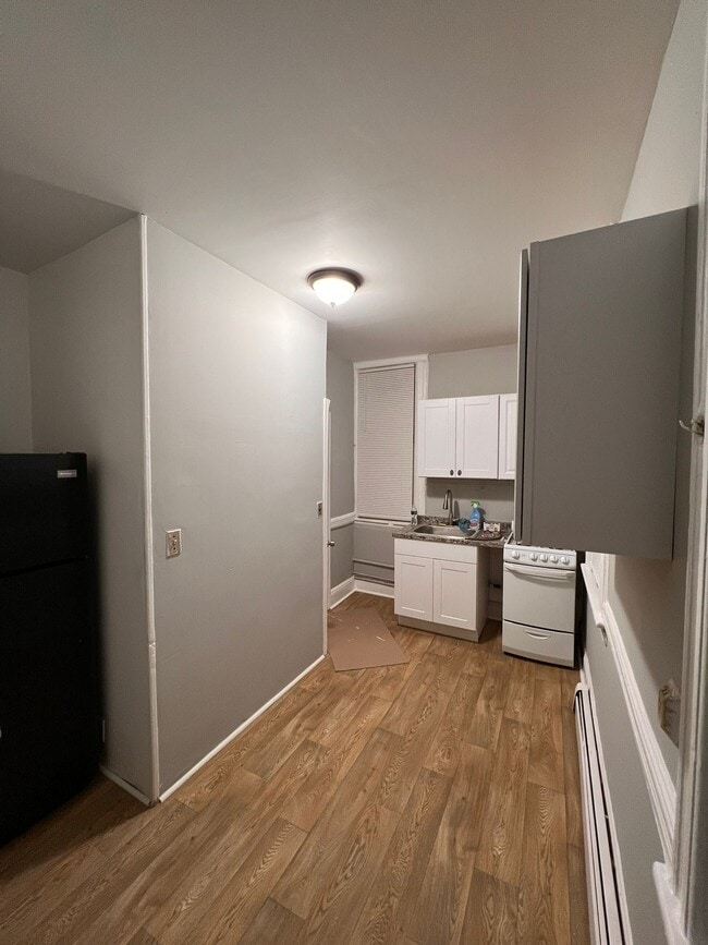 Building Photo - 1317 44th St Unit 2R