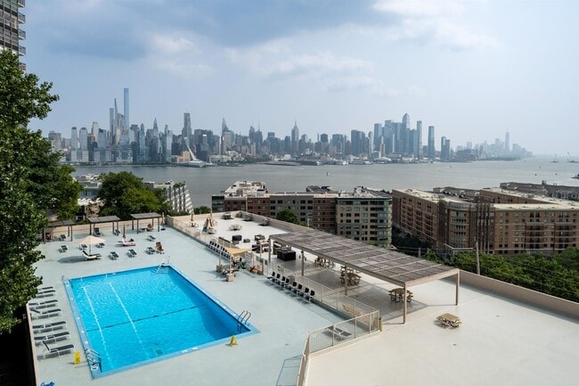 Building Photo - 6040 JFK Blvd E Unit 30-B