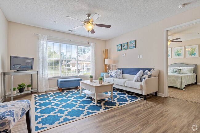 Spacious Living Room with Ceiling Fan - Cherry Grove Commons Apartments