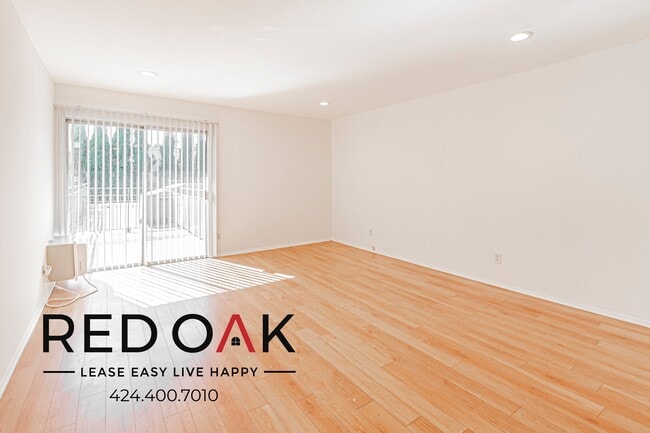 Building Photo - 20200 Sherman Way Unit 114
