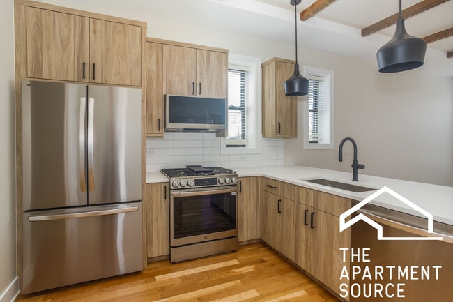 Building Photo - 4949 N Oakley Ave Unit 3