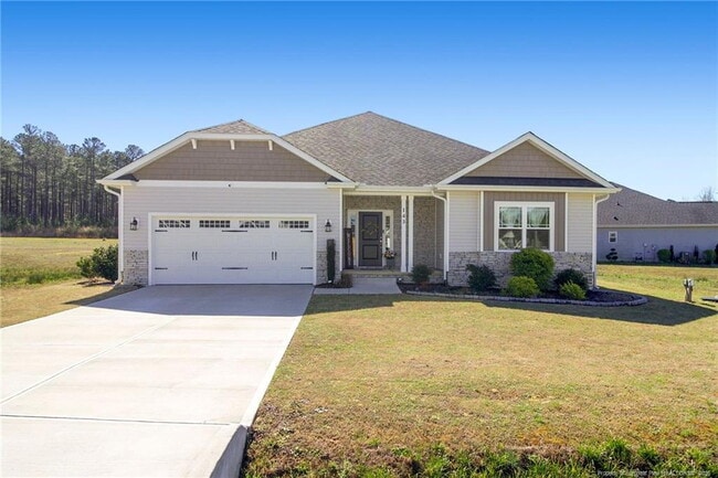 Building Photo - Charming 4-Bed home with Granite Touches & Cozy Fireplace in Sanford, NC!