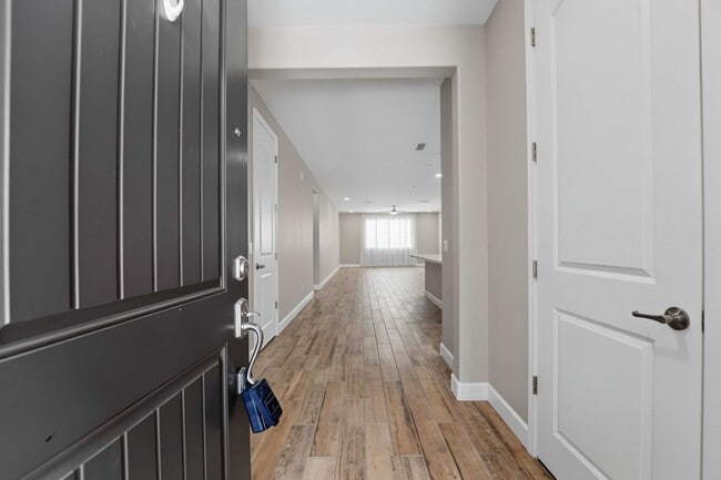 Photo - Luxury Kitchen + 3 Bed & Den/Office in Azure Canyon | Quartz, Gas Cooktop & More