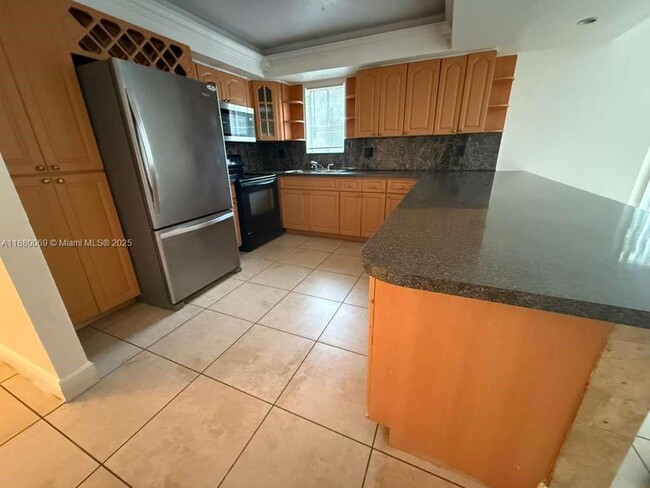 Photo - 2660 W 76th St Unit 209