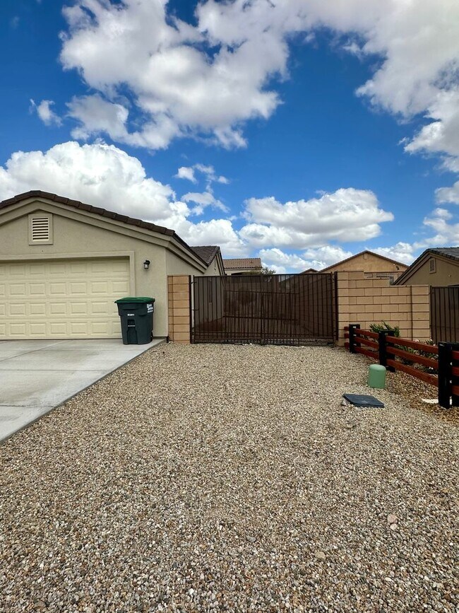 Photo - Modern 3 Bed, 2 Bath Home with Open Floor Plan & New Flooring – Fort Mohave- Available Now!