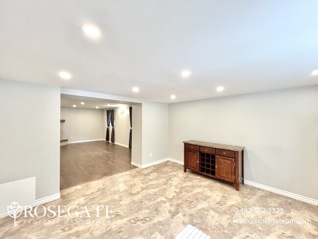 Photo - Spacious 1-Bedroom Basement Apartment in P... Unit 2