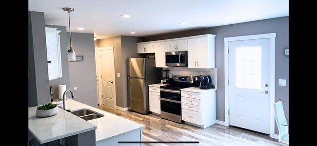 Photo - Charming 3-Bed, 3-Bath Two-Story Rental Home with Deck – Pets Welcome!