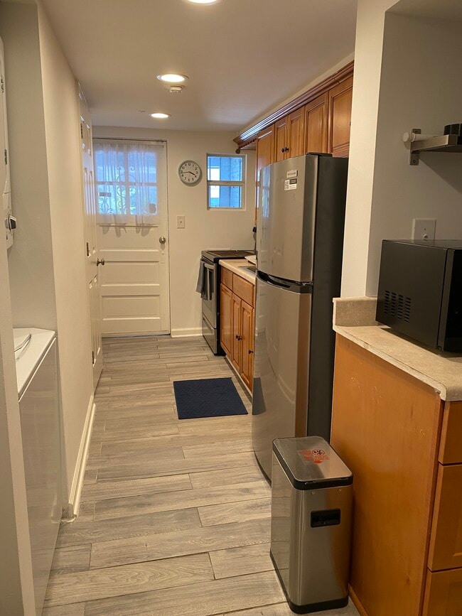 Entryway and kitchen - 4506 Iowa Ave NW Unit 1