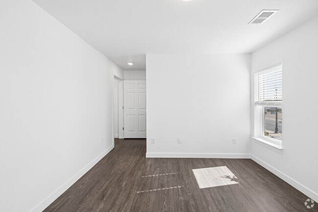 3BR, 2BA - 1,135SF - Primary Bedroom