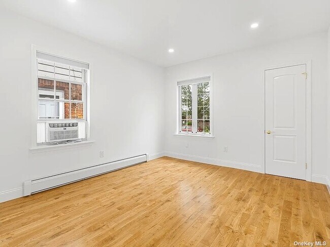 Photo - 65-44-65168 168th St Unit 1+2 FL