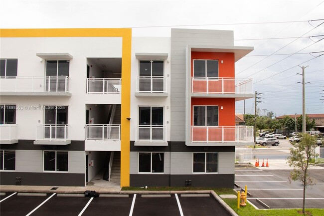 Building Photo - 1451 W 29th St Unit 206
