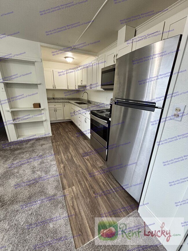Photo - Singh Tacoma 4-Plex Unit 4