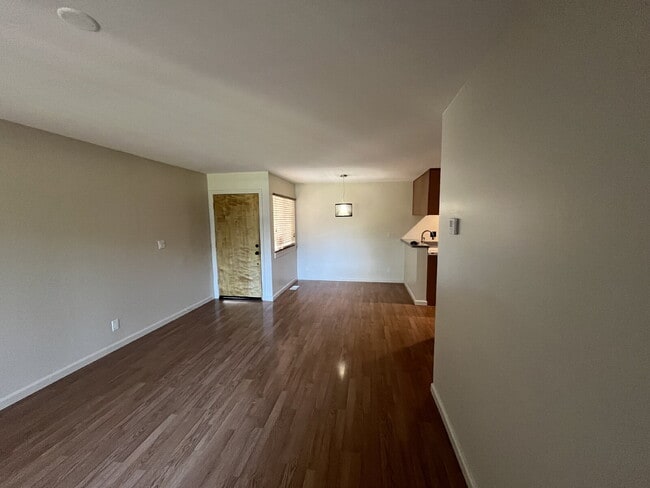 Downstairs 2 bedroom unit with parking and a patio
