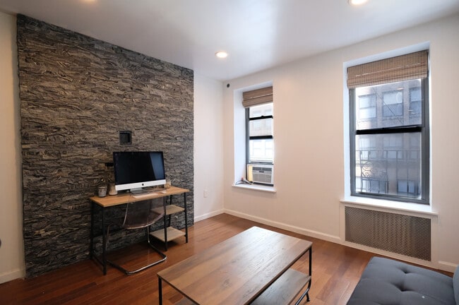 Building Photo - 318 W 36th St. Rental