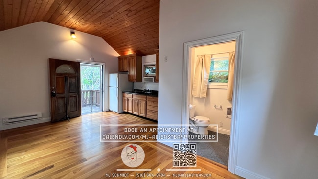 Photo - Quaint cottage with hardwood floors, private entrance and patio, surrounded by lush gardens!