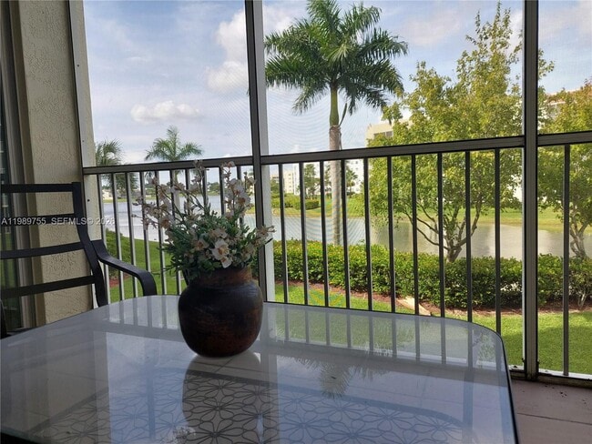 Building Photo - 10710 NW 66th St Unit 202