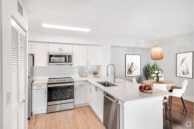 Our chef-inspired kitchens feature designer finishes and stainless steel appliances - Windsor Pembroke Pines Rental