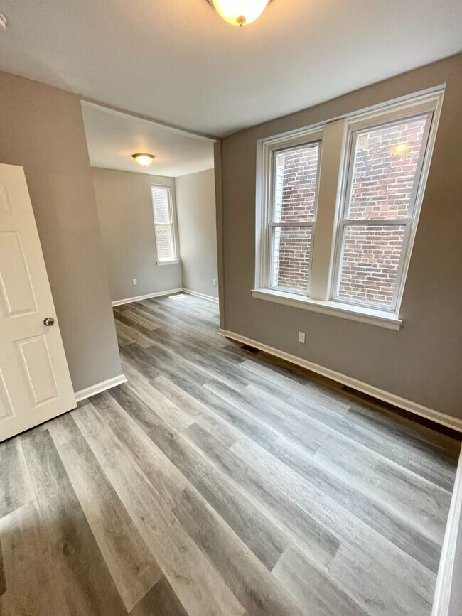 Photo - Move-In Ready 4BR Home with Bright Interiors & Ample Storage