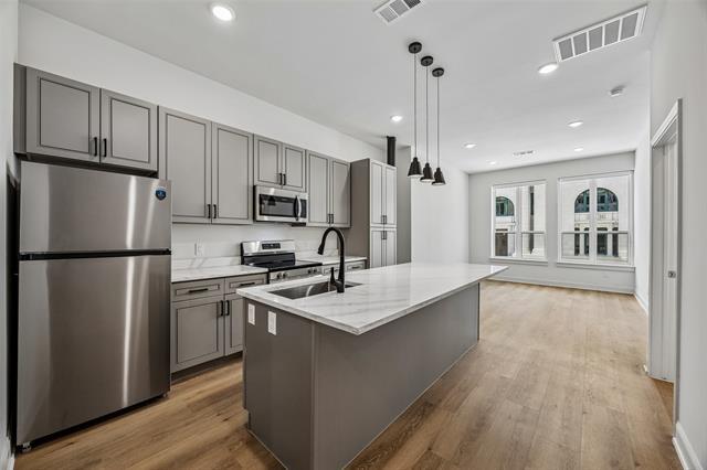 Building Photo - 2010 Commerce St Unit B202